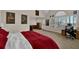 Large main bedroom with king bed, window seat, and office area at 102 Twilight Overlook, Canton, GA 30114