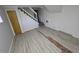 Unfinished basement area with laminate flooring at 2652 Winthrop Rd, Atlanta, GA 30337