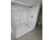 Bathroom with a shower and built in shelving at 2652 Winthrop Rd, Atlanta, GA 30337