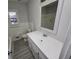 Clean bathroom with new vanity and flooring at 2652 Winthrop Rd, Atlanta, GA 30337