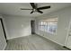 Simple bedroom with new flooring and neutral walls at 2652 Winthrop Rd, Atlanta, GA 30337