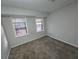 Spacious bedroom with neutral walls and carpet flooring at 2652 Winthrop Rd, Atlanta, GA 30337