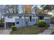 Newly painted ranch home with a carport and landscaped yard at 2652 Winthrop Rd, Atlanta, GA 30337