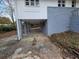 House exterior with gray brick, carport and landscaping at 2652 Winthrop Rd, Atlanta, GA 30337