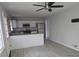 Modern kitchen with white cabinets, granite countertops, and stainless steel appliances at 2652 Winthrop Rd, Atlanta, GA 30337