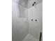 Simple shower with white tiled walls at 2652 Winthrop Rd, Atlanta, GA 30337