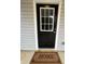 Welcoming front door with a decorative glass insert and a 