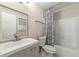 Guest bathroom with modern fixtures, a shower/tub combo, and neutral decor at 4053 Cooper Ridge Se Ct, Smyrna, GA 30080