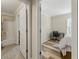 Hallway leading to bedroom and bathroom; features wood-look flooring and simple decor at 4053 Cooper Ridge Se Ct, Smyrna, GA 30080