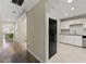 Hallway with hardwood-style flooring and view of the kitchen at 4053 Cooper Ridge Se Ct, Smyrna, GA 30080