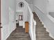 Welcoming foyer with hardwood floors and a staircase leading to the second floor at 4289 Brighton Nw Way, Kennesaw, GA 30144