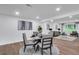 Bright dining area with a round table and four chairs, open to the living room at 2231 Deep Creek Dr, Marietta, GA 30068