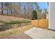 Private backyard with wooden fence and patio at 2991 Greyhawk Ln, Cumming, GA 30040