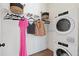 Convenient laundry room with washer, dryer, and hanging rod at 123 Beardon Se Cir # 6, Atlanta, GA 30316