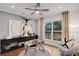 Modern home office with large window, stylish furniture, and hardwood floors at 6101 Marigold Way, Atlanta, GA 30349