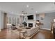 Cozy living room with fireplace, large windows, and comfortable seating at 6101 Marigold Way, Atlanta, GA 30349