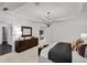 Large main bedroom with a chandelier, a dresser, and an ensuite bathroom at 6101 Marigold Way, Atlanta, GA 30349