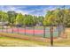 Community tennis and basketball courts at 2410 Emerald Dr, Loganville, GA 30052