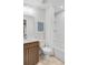 Clean and bright bathroom with tub/shower combo and modern fixtures at 6097 Marigold Way, Atlanta, GA 30349