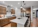 Bright, open kitchen featuring stainless steel appliances, a large island, and ample counter space at 6097 Marigold Way, Atlanta, GA 30349