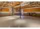 Unfinished basement/garage space with ample storage at 1103 Etowah Valley Ln, Woodstock, GA 30189