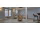 Finished basement with seating area and access to the backyard at 1103 Etowah Valley Ln, Woodstock, GA 30189