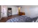 Bedroom with hardwood floors, double doors to closet, and en-suite bath at 3090 Karen Ne Ln, Marietta, GA 30062