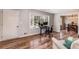 Hardwood floor living room with view into dining area and office space at 3090 Karen Ne Ln, Marietta, GA 30062