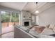 Living room with stone fireplace, hardwood floors, and deck access at 3090 Karen Ne Ln, Marietta, GA 30062