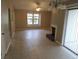 Open living space with tile floors and fireplace at 5426 Martins Crossing Rd, Stone Mountain, GA 30088