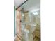 Walk-in shower with tiled walls and glass enclosure at 1280 W Peachtree Nw St # 3908, Atlanta, GA 30309