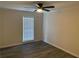 Empty bedroom featuring neutral paint, ceiling fan, and wood-look flooring at 1166 Booth Sw Rd # 610, Marietta, GA 30008