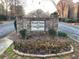 Stone entrance sign for WoodChase and Coral Ridge private communities at 1166 Booth Sw Rd # 610, Marietta, GA 30008