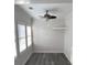 Bright dining room with hardwood floors, multiple windows, and a ceiling fan at 1166 Booth Sw Rd # 610, Marietta, GA 30008