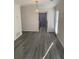 Spacious dining area with hardwood floors and a view into the kitchen at 1166 Booth Sw Rd # 610, Marietta, GA 30008