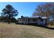 One-story home with large covered porch and front yard at 5333 Pine Valley Rd, Powder Springs, GA 30127