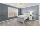 Charming bedroom with a white bed frame and gray walls at 2622 Neighborhood Walk, Villa Rica, GA 30180