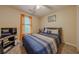 Bright bedroom featuring a comfortable bed and a flat-screen TV at 4614 Post Ridge Ln, Lithonia, GA 30038