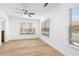 Well-lit bedroom with hardwood floors and ceiling fan at 372 16Th Nw St, Atlanta, GA 30363