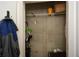 Well-organized coat closet with shelving and rod at 855 Peachtree Ne St # 2412, Atlanta, GA 30308