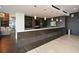 Community bar with sleek countertops and stylish pendant lighting at 855 Peachtree Ne St # 2412, Atlanta, GA 30308