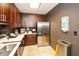 Well-equipped community kitchen with stainless steel appliances and ample cabinetry at 855 Peachtree Ne St # 2412, Atlanta, GA 30308