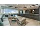 Relaxing community lounge with comfortable seating and city views at 855 Peachtree Ne St # 2412, Atlanta, GA 30308
