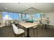 Game room with pool table and seating area, offering a space for recreation and entertainment at 855 Peachtree Ne St # 2412, Atlanta, GA 30308