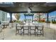 Outdoor grilling area with seating and a pergola at 855 Peachtree Ne St # 2412, Atlanta, GA 30308