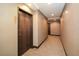 Building hallway with carpet and neutral walls at 855 Peachtree Ne St # 2412, Atlanta, GA 30308