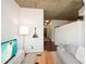 Living room with hardwood floors and city views at 855 Peachtree Ne St # 2412, Atlanta, GA 30308