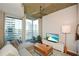 Spacious living room with hardwood floors and city views at 855 Peachtree Ne St # 2412, Atlanta, GA 30308