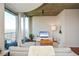 Spacious living room with hardwood floors and city views at 855 Peachtree Ne St # 2412, Atlanta, GA 30308
