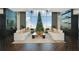 Elegant lobby with comfortable seating and a Christmas tree at 855 Peachtree Ne St # 2412, Atlanta, GA 30308